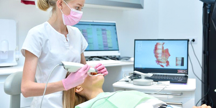 Patient undergoing digital impression scan
