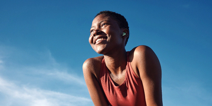 Lady smiles outdoors