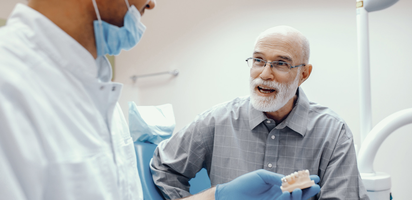 man smiling getting implant