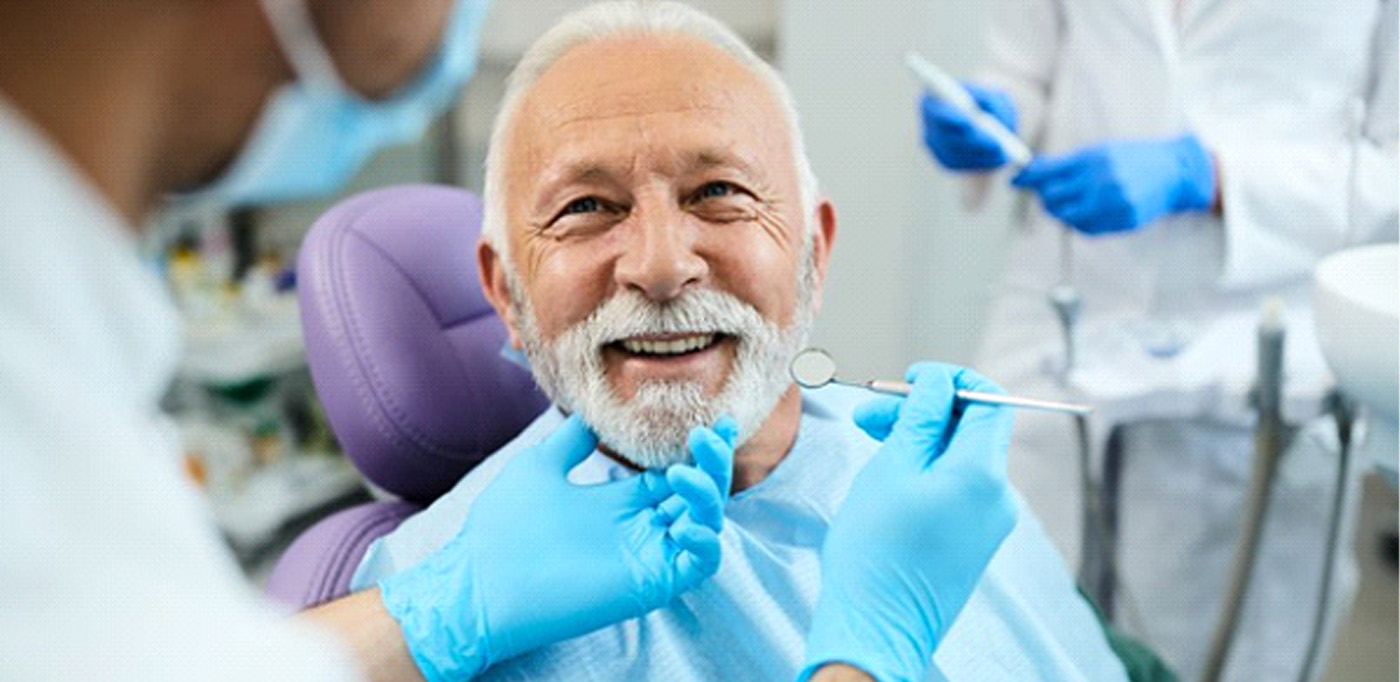 man smiling getting implant